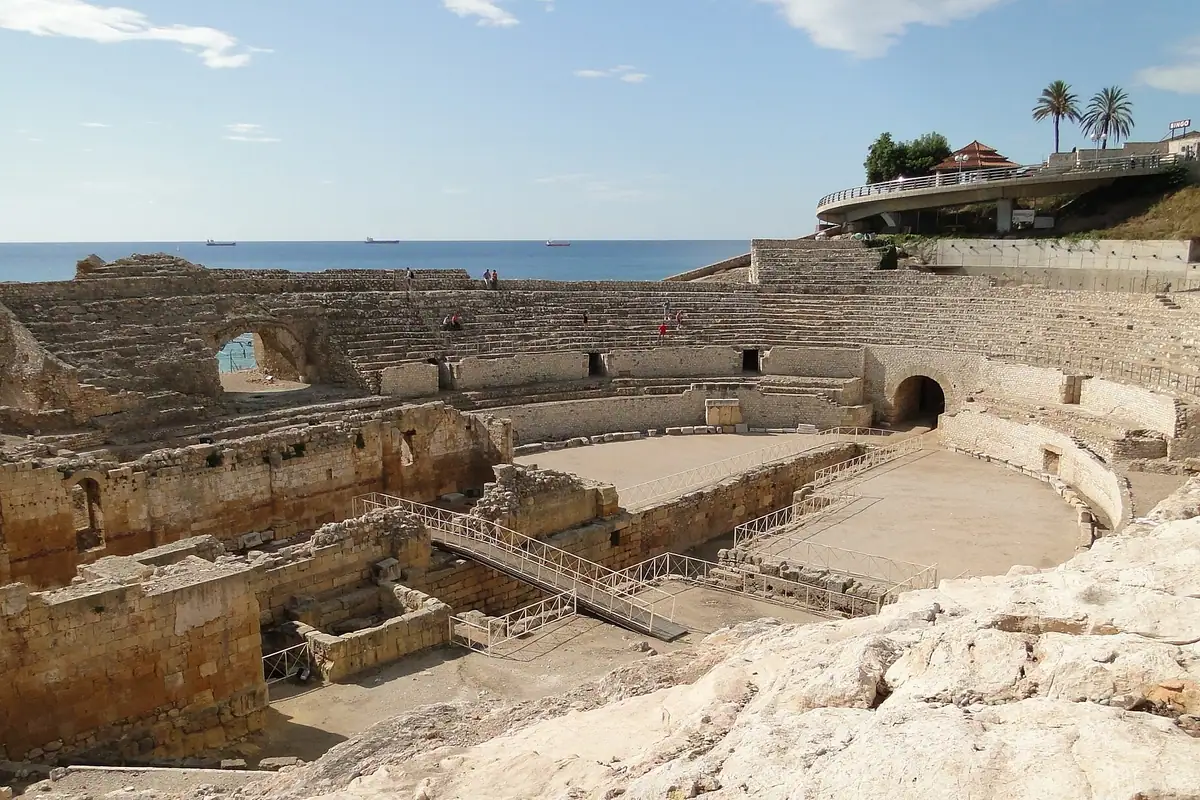 The amphitheatre, with the Mediterranean directly behind it.